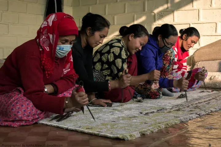 Workers in a GoodWeave factory in Nepal © GoodWeave